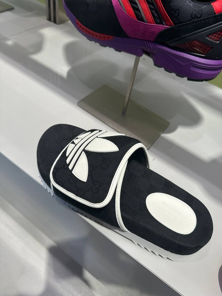 GUCCI Slides side view - Men's luxury Shoes