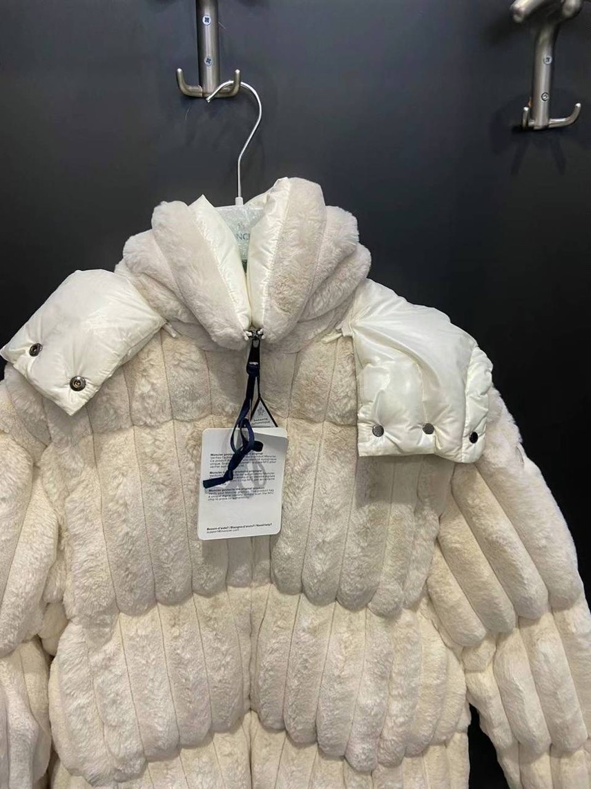 MONCLER Down jacket side view - Women's luxury Clothes