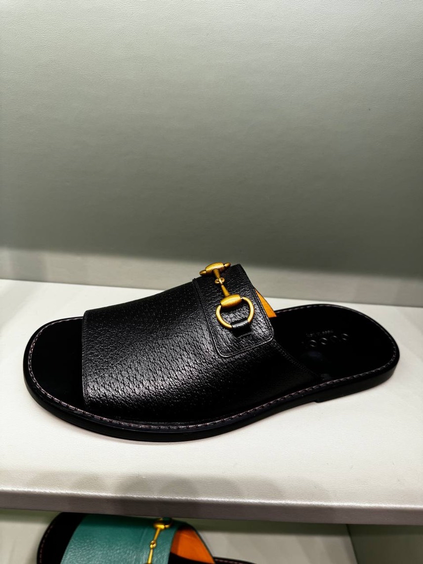 GUCCI Slides front view - Men's luxury Shoes