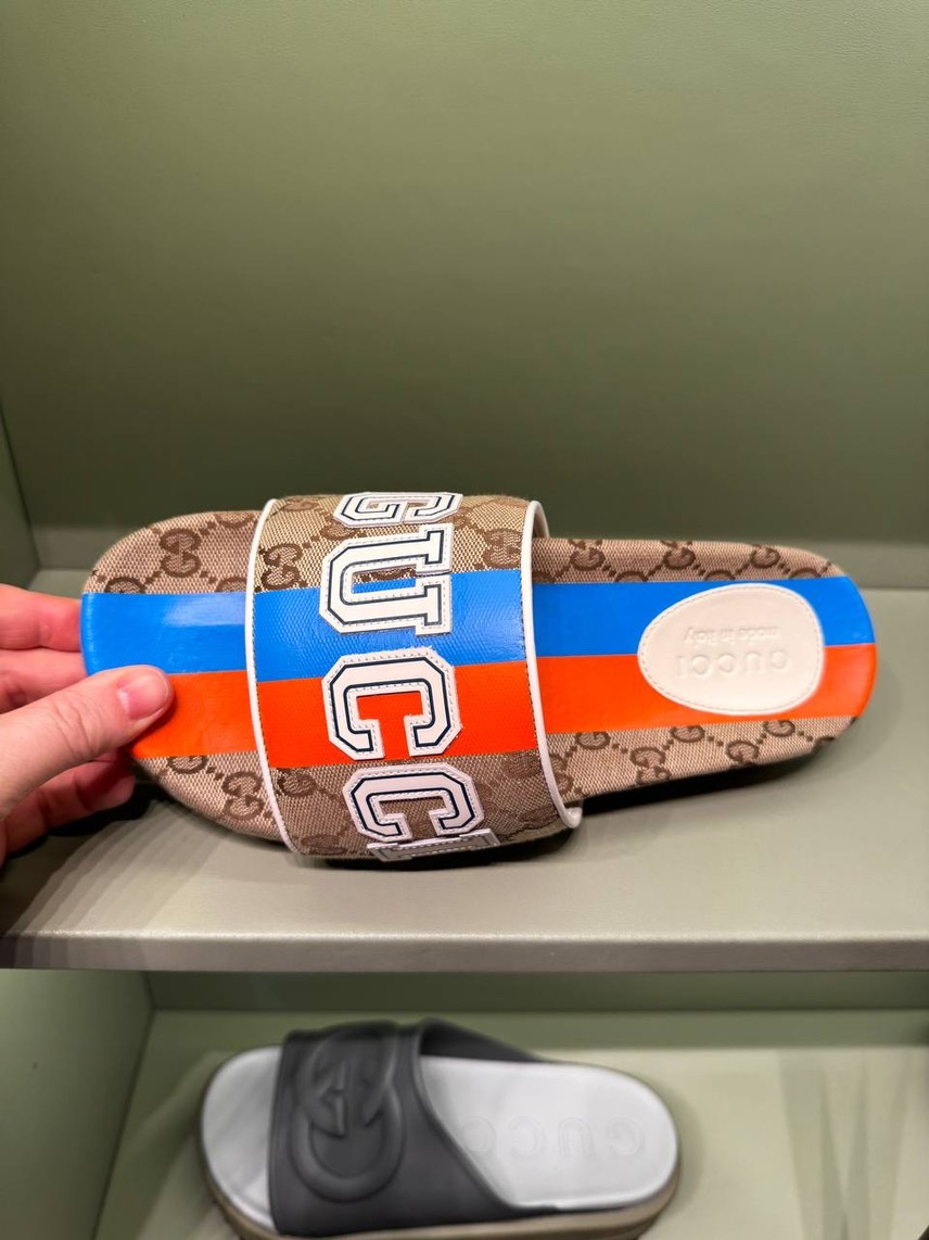 GUCCI Slides front view - Men's luxury Shoes