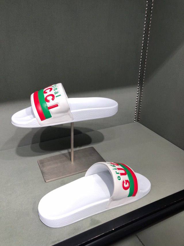 GUCCI Slides front view - Men's luxury Shoes