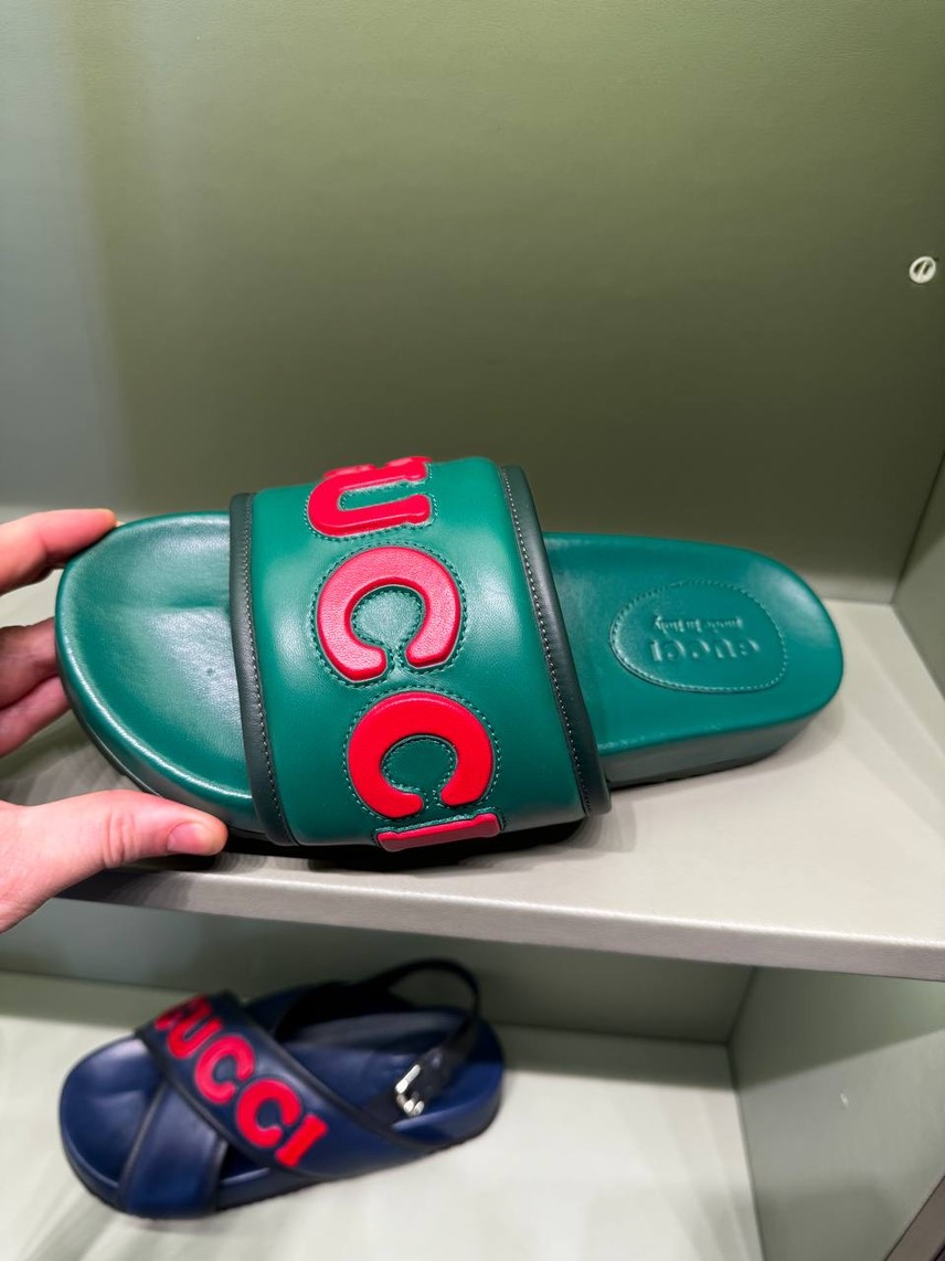 GUCCI Slides side view - Men's luxury Shoes