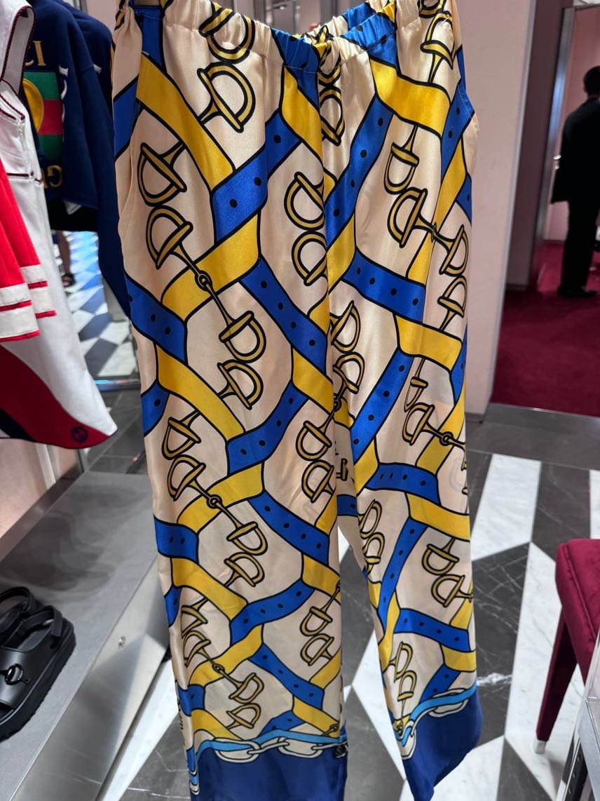 GUCCI Trousers side view - Women's luxury Clothes