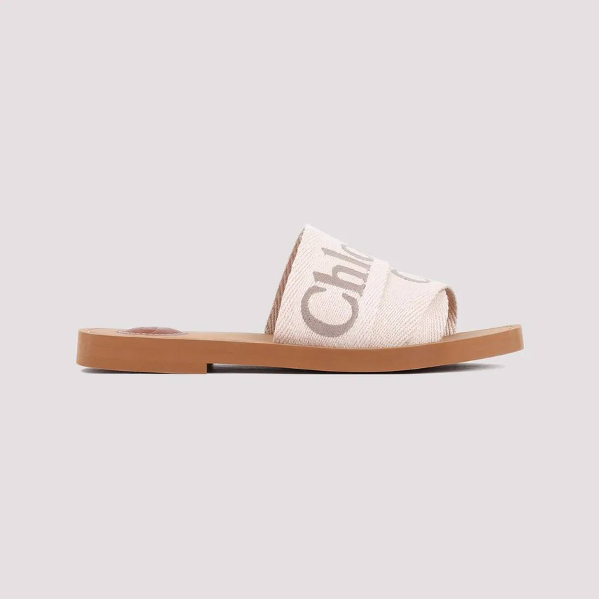 COACH Slides side view - Women's luxury Shoes