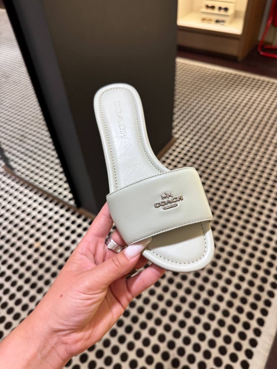 COACH Slides side view - Women's luxury Shoes