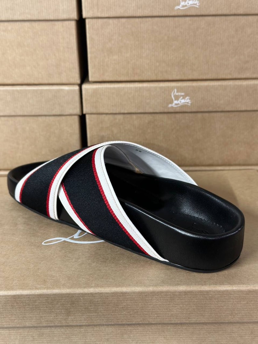 CHRISTIAN LOUBOUTIN Slides side view - Women's luxury Shoes