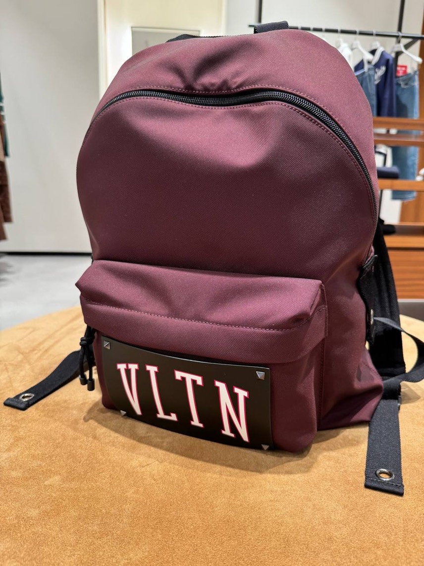 VALENTINO GARAVANI Backpack side view - unisex luxury Bags