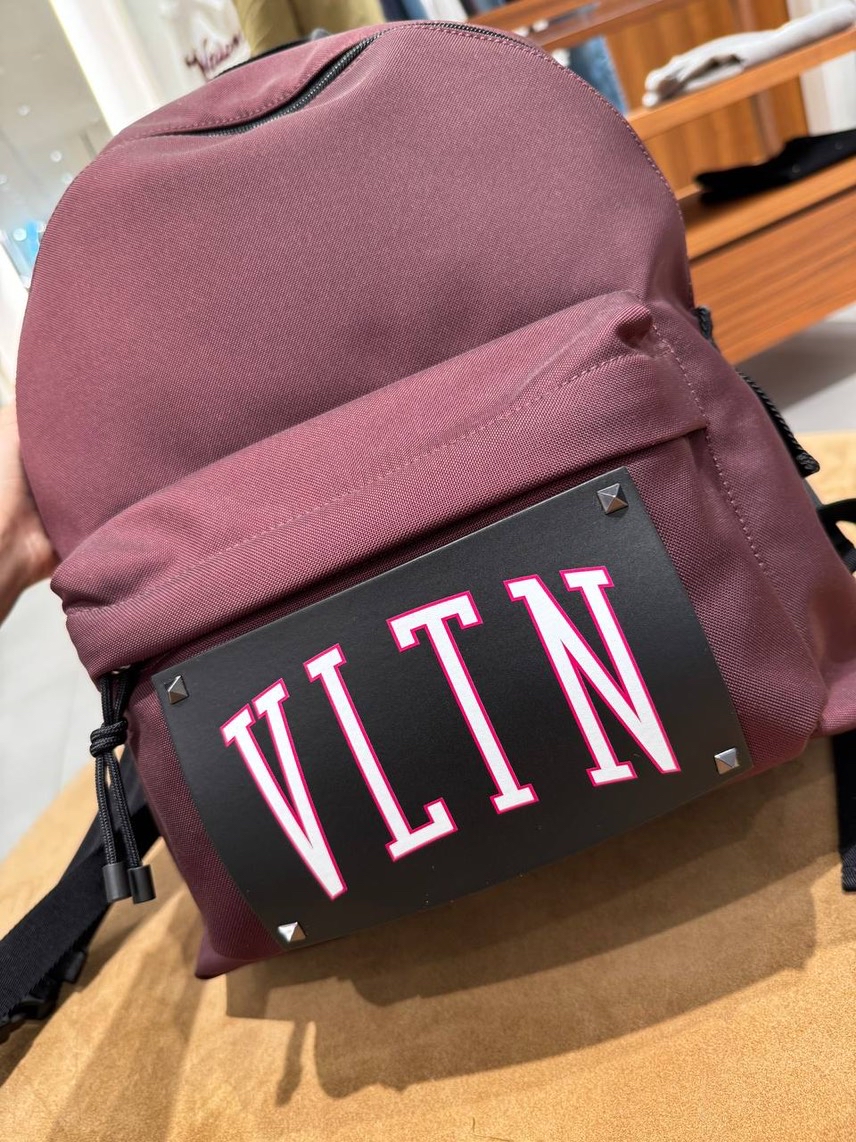 VALENTINO GARAVANI Backpack side view - unisex luxury Bags
