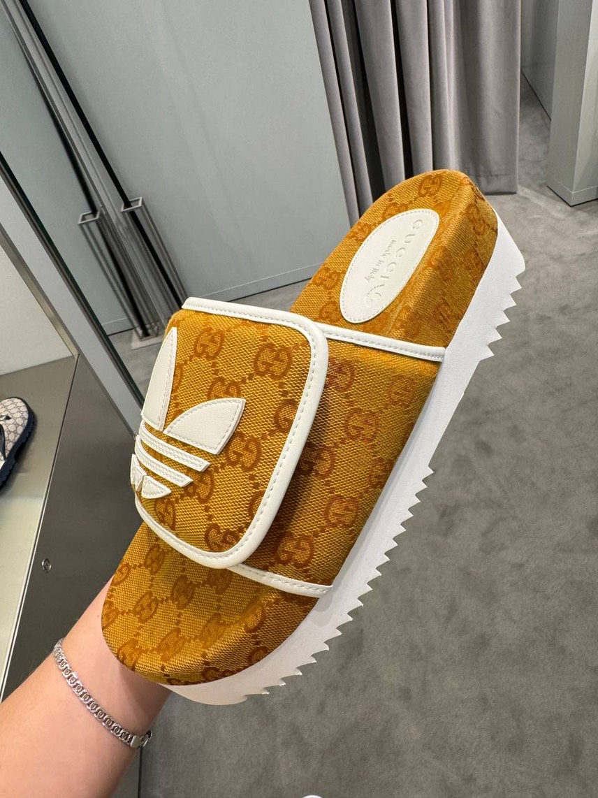 GUCCI Slides front view - Men's luxury Shoes