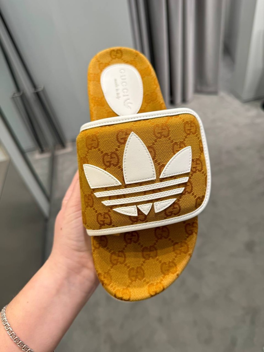 GUCCI Slides side view - Men's luxury Shoes