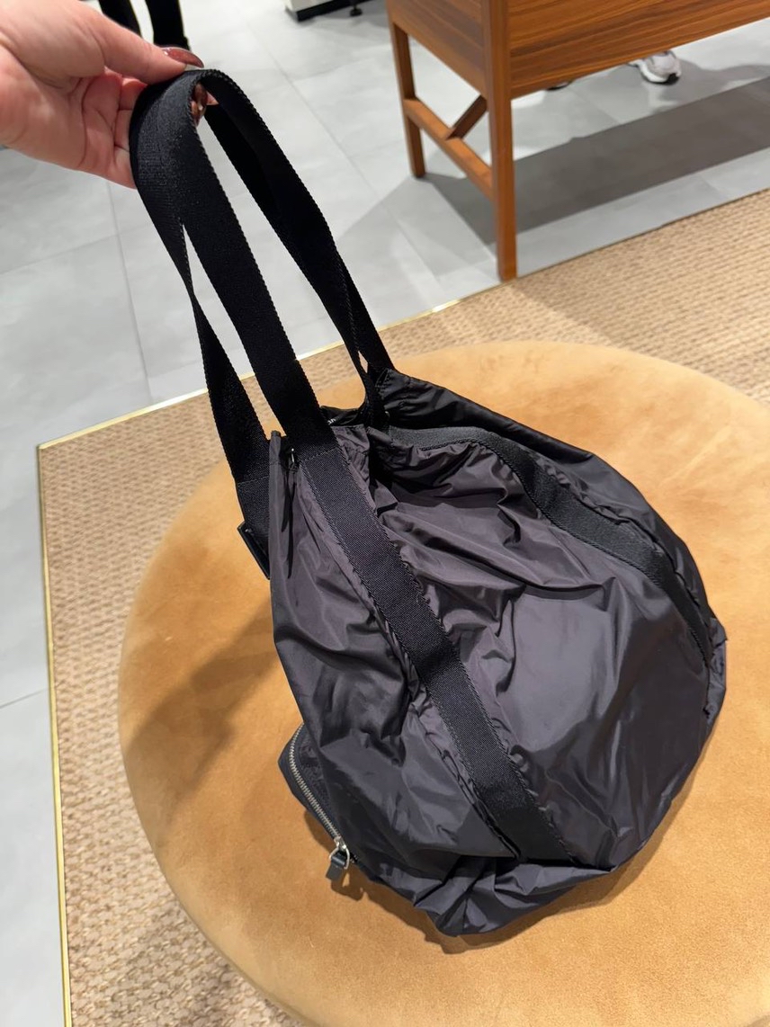 VALENTINO GARAVANI Backpack side view - unisex luxury Bags