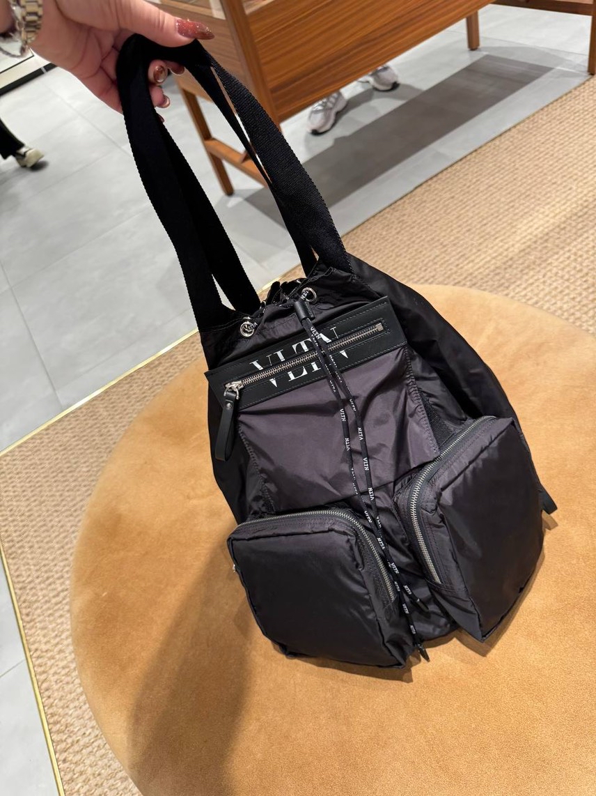 VALENTINO GARAVANI Backpack side view - unisex luxury Bags