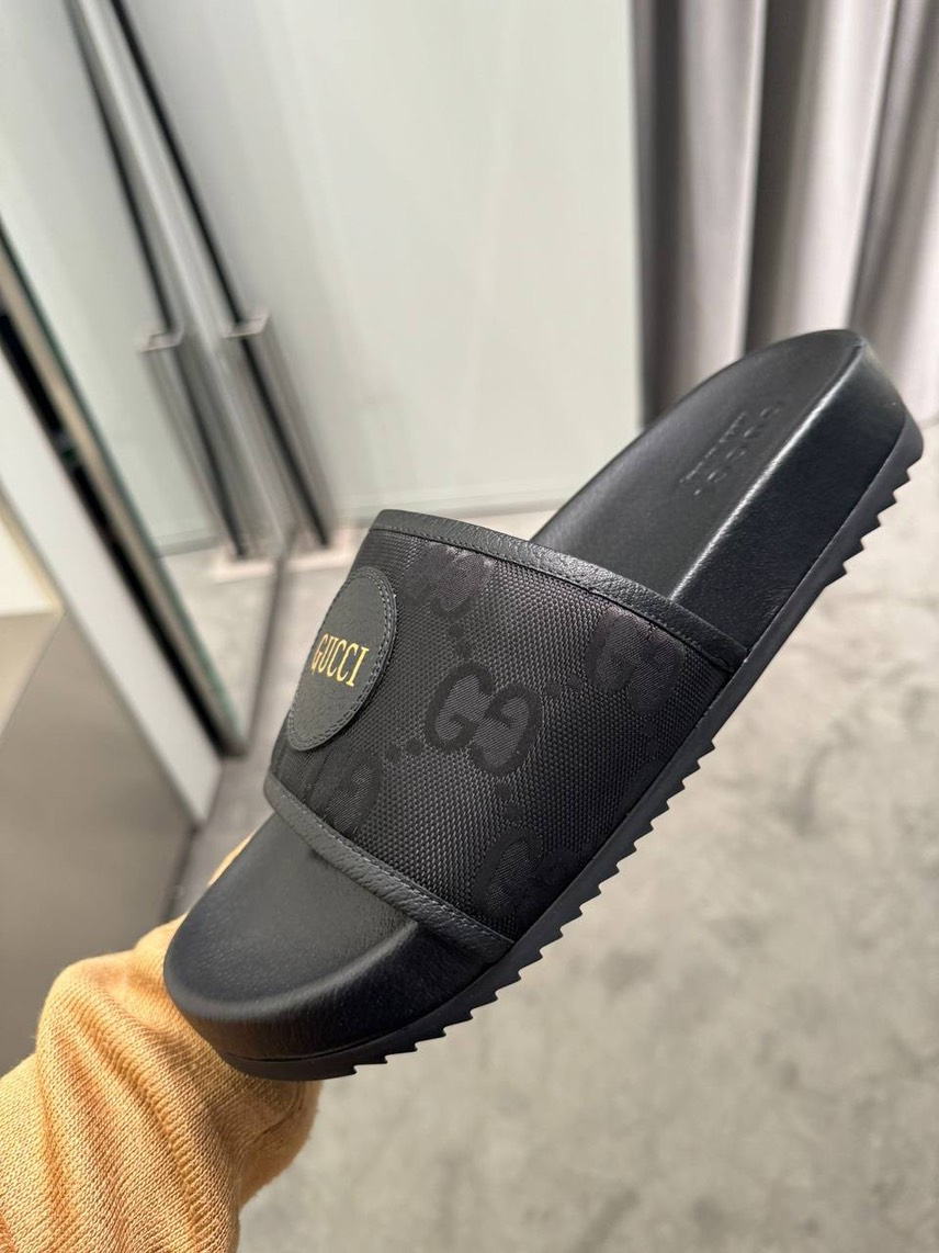 GUCCI Slides front view - Men's luxury Shoes